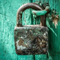 Rusty Padlock On Blue Door Rusty Padlock On Blue Door ALT